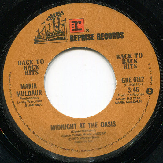 Maria Muldaur – Midnight At The Oasis / Don't You Feel My Leg (Don't You Make Me High)